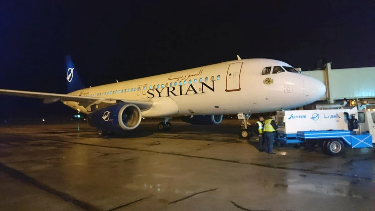 In this photo released by the Syrian official news agency SANA, a Syrian commercial plane coming from Lebanon, lands at Aleppo Airport, Syria, early Friday, Jan. 15, 2021. (AP)