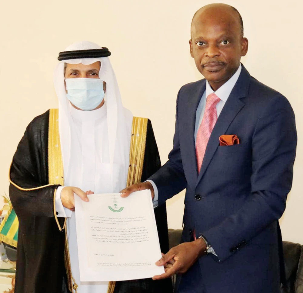 Saudi envoy to Ghana, Mishaal bin Hamdan Al-Roqi, left, presenting his credentials to Togolese Minister of Foreign Affairs Robert Dossi. (SPA)