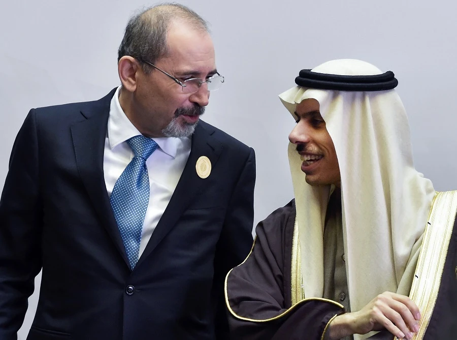 Saudi Foreign Minister Faisal bin Farhan (R) and his Jordanian counterpart Ayman Safadi chat ahead of a meeting for top diplomats of Arab and African coastal states, in the Saudi capital Riyadh on January 6, 2020. (File/AFP)