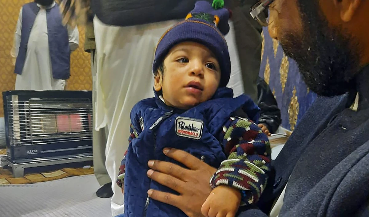 One-year-old Abdullah is reunited with his family in Quetta on Jan. 15 after undergoing successful treatment at Maternity and Children Hospital in Makkah. (Photo courtesy: Pakistan Consulate Jeddah)