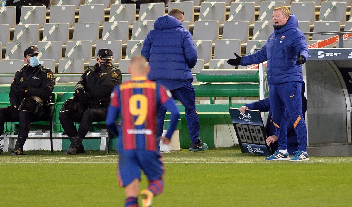 Barcelona's Dutch coach Ronald Koeman gestures during the Spanish Super Cup semi final match against Real Sociedad on January 13, 2021. (AFP)
