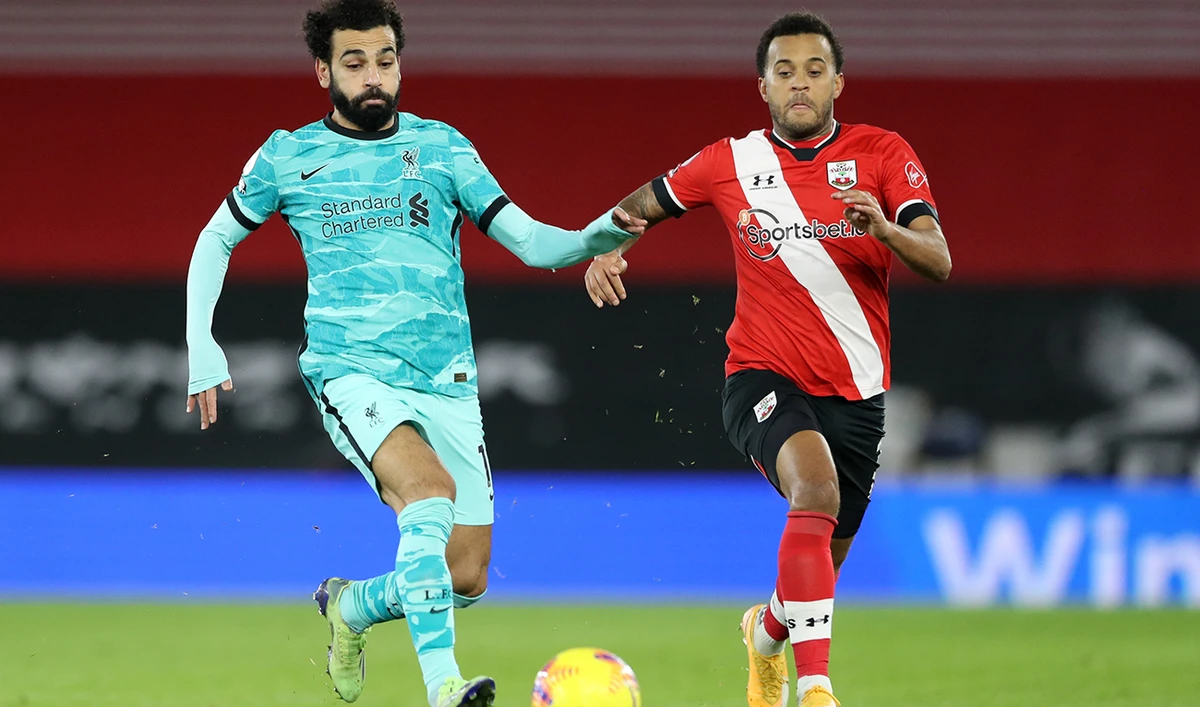 Liverpool’s midfielder Mohamed Salah vies with Southampton’s defender Ryan Bertrand during a recent English Premier League match in southern England. (AFP)