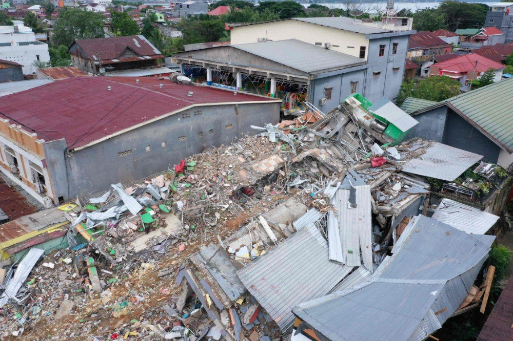 Quake death toll at 56 as Indonesia struggles with string of disasters