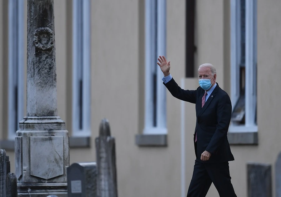 US President-elect Joe Biden waves as he leaves St. Joseph on the Brandywine Roman Catholic Church on January 16, 2021 in Wilmington, Delaware. (File/AFP)