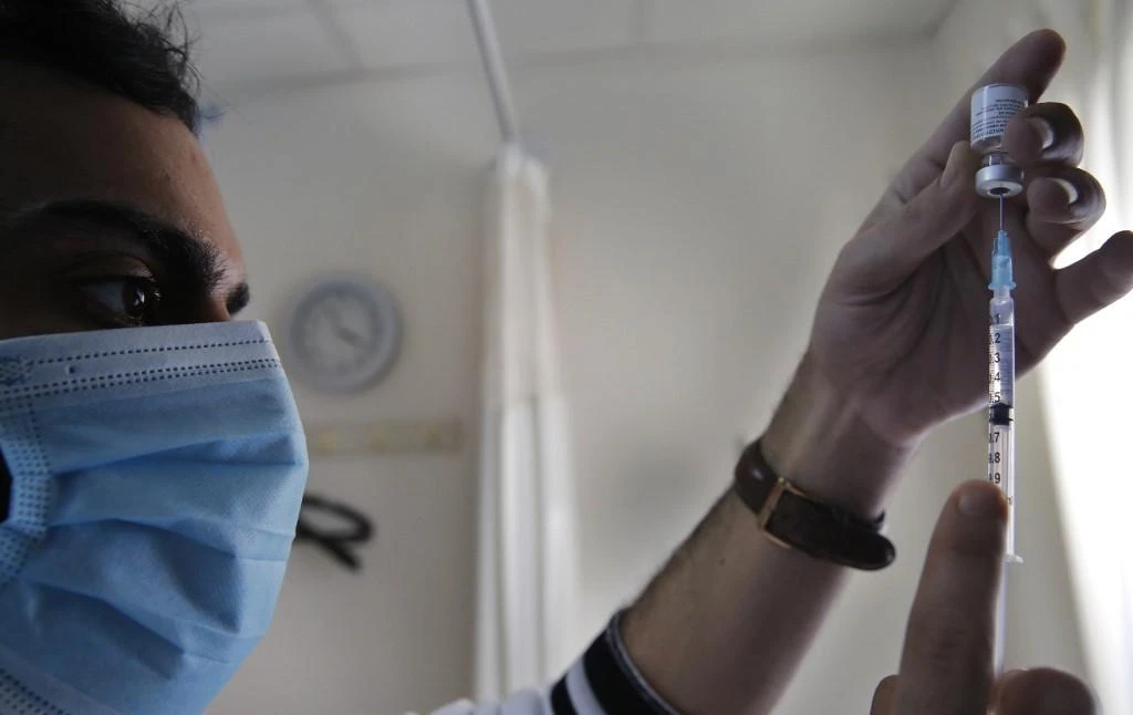 The Israel Prison Service said Sunday it will begin vaccinating all incarcerated people against Covid-19, including Palestinians, following calls from right groups. (File/AFP)
