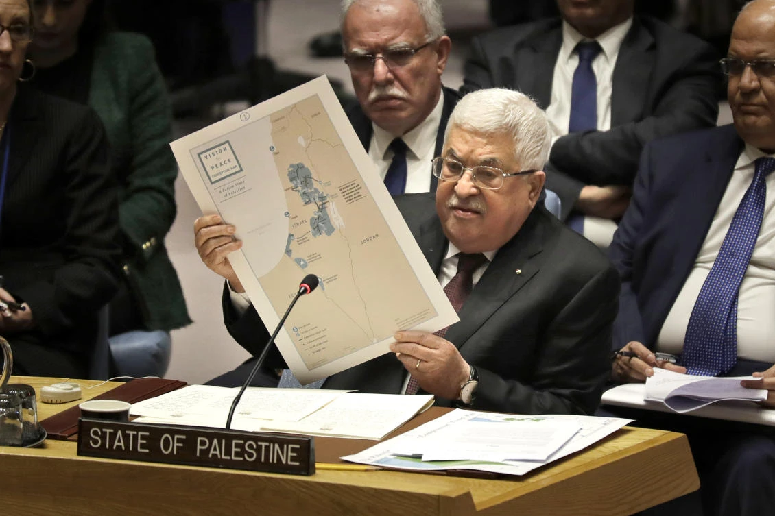 In this Feb. 11, 2020 file photo, Palestinian President Mahmoud Abbas speaks during a Security Council meeting at United Nations headquarters. Abbas has announced that the first presidential and parliamentary elections since 2006 will be held later in 2021. (AP Photo/Seth Wenig, File)