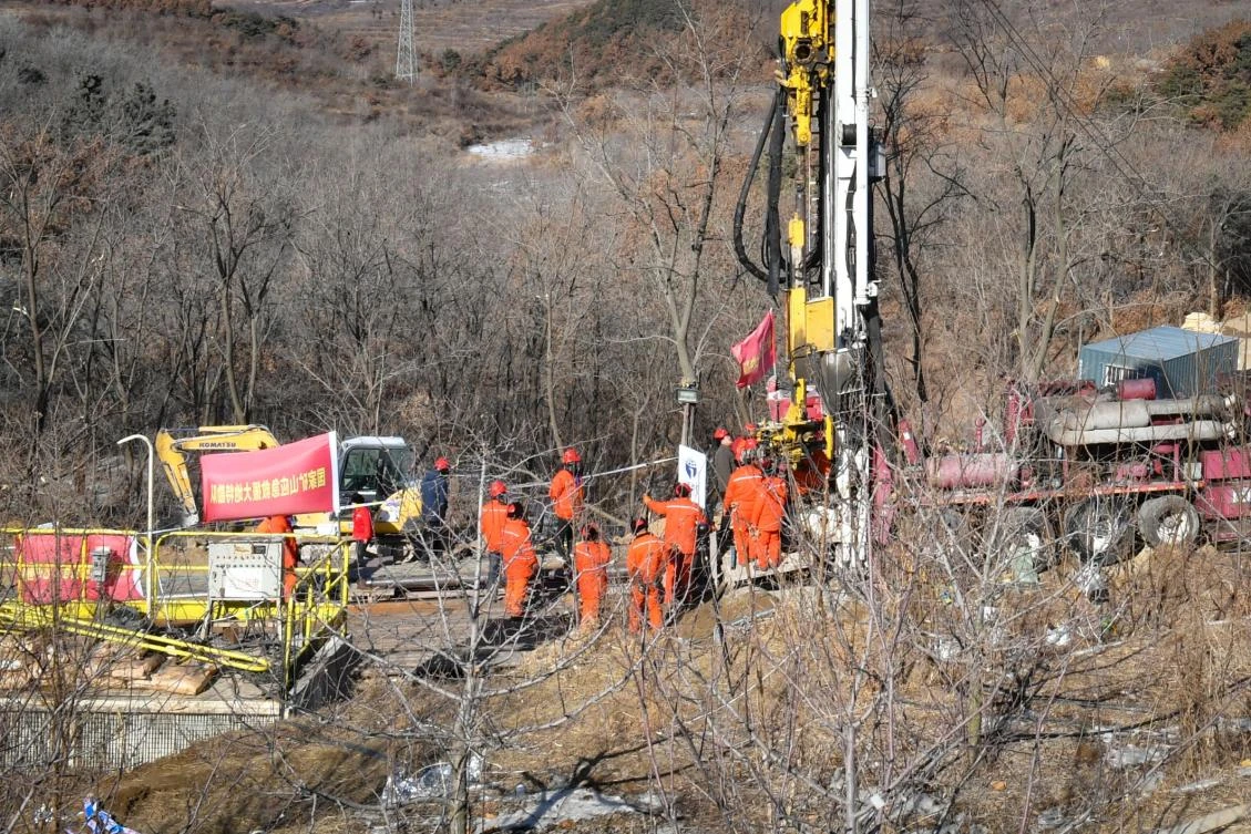 Rescuers have already dug three channels and sent food, medicine, paper and pencils down thin shafts. (AFP)
