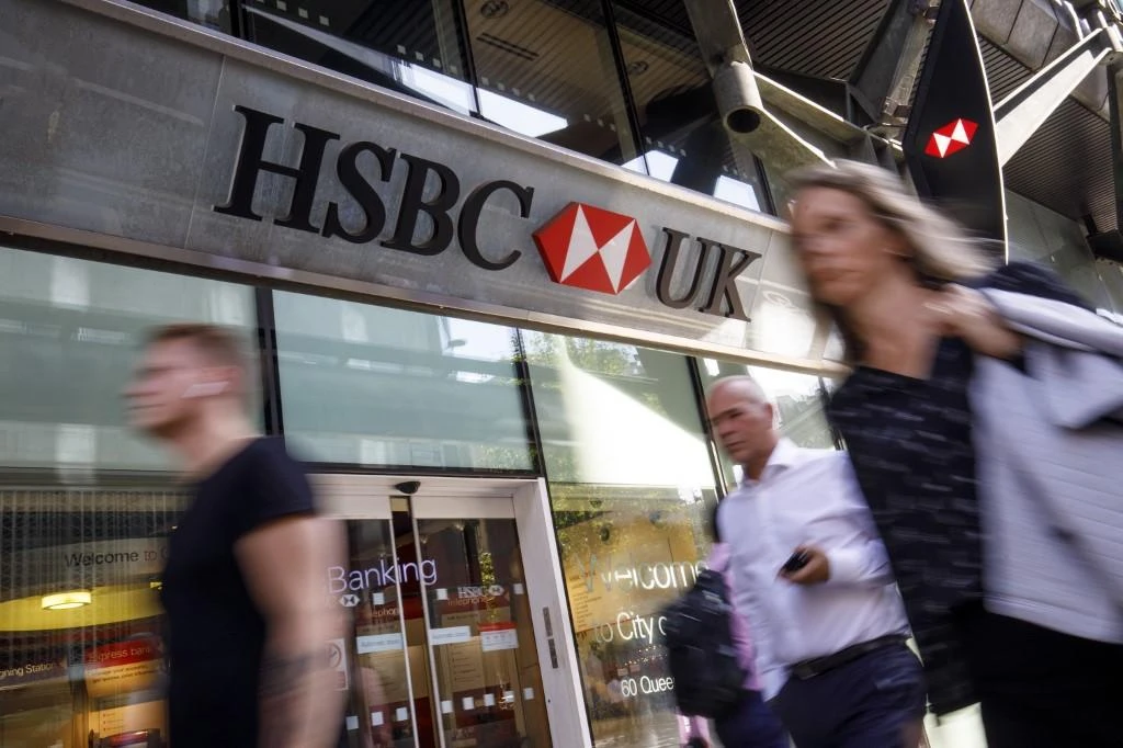 HSBC said it had begun trialing different branch formats and decided to provide fewer full-service branches focused in large cities and towns. (AFP)