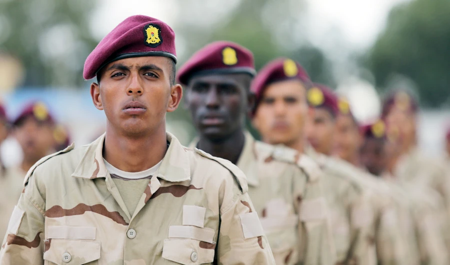 Soldiers loyal to Libyan military commander Khalifa Haftar stand in formation during Independence Day celebrations in Benghazi, Libya December 24, 2020. (REUTERS)
