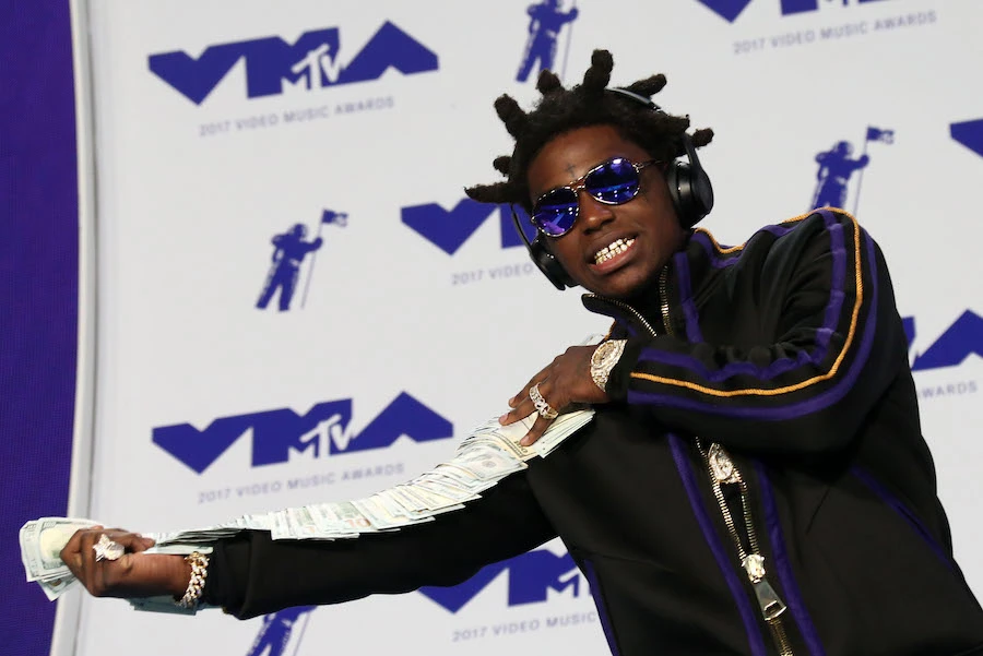 Rappers Kodak Black and Lil Wayne among 73 pardoned on Trump’s last day