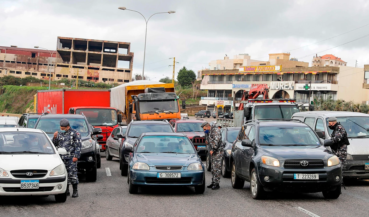 Lebanon lockdown extension recommended as cabbies, soldiers clash at airport