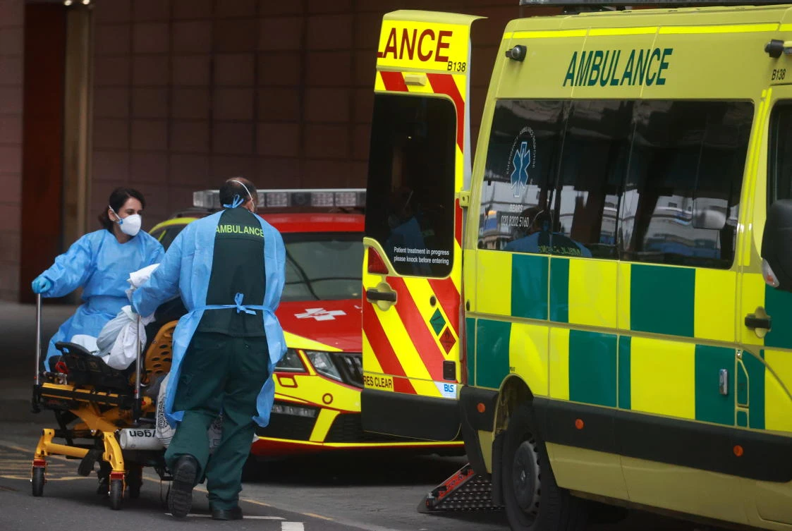 Health care workers transport a patient at the Royal London Hospital as the spread of the coronavirus disease (COVID-19) continues, in London, Britain, January 21, 2021. (Reuters)