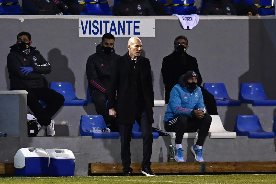 Real Madrid’s head coach Zinedine Zidane watches the play during a Spanish Copa del Rey game between Alcoyano and Real Madrid at the El Collao stadium in Alcoy, Spain, Jan. 20, 2021. (AP Photo)