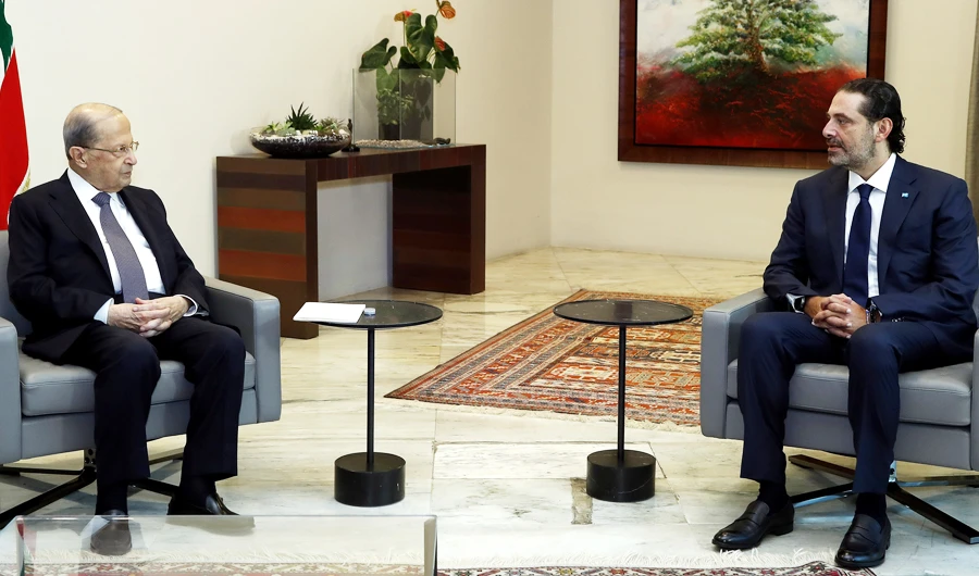 Lebanon's President Michel Aoun meets with former Prime Minister Saad al-Hariri at the presidential palace in Baabda, Lebanon October 12, 2020. (REUTERS)