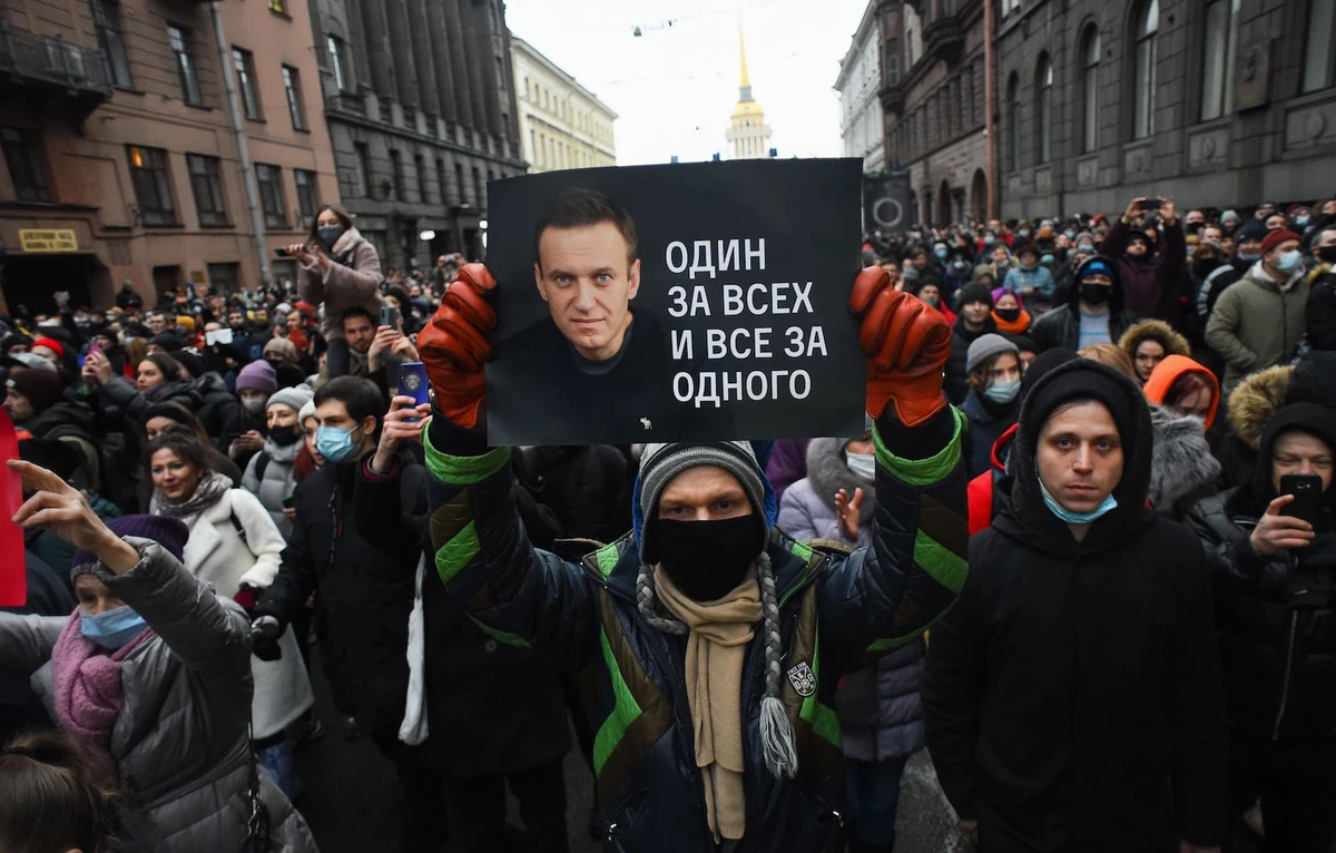 People attend a rally in support of jailed opposition leader Alexei Navalny in Saint Petersburg on January 23, 2021. (AFP)