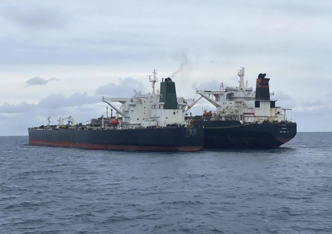 Above, the Iranian-flagged MT Horse, left, and Panamanian-flagged MT Frea tankers are anchored together in Pontianak waters off Borneo island on Jan. 24, 2021. (Indonesian Maritime Security Agency via AP)