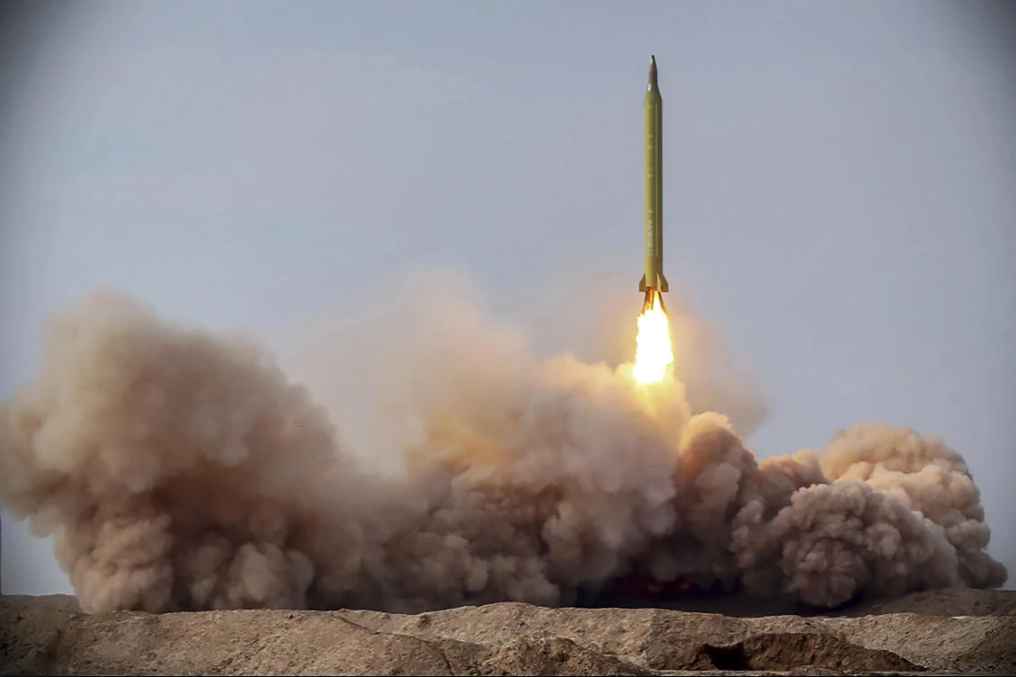 In this file photo released Jan. 16, 2021, by the Iranian Revolutionary Guard, a missile is launched in a drill in Iran. On Tuesday, Jan. 26, 2021, Iran warned the Biden administration that it will not have an indefinite time period to rejoin the 2015 nuclear deal between Tehran and world powers. (AP, File)