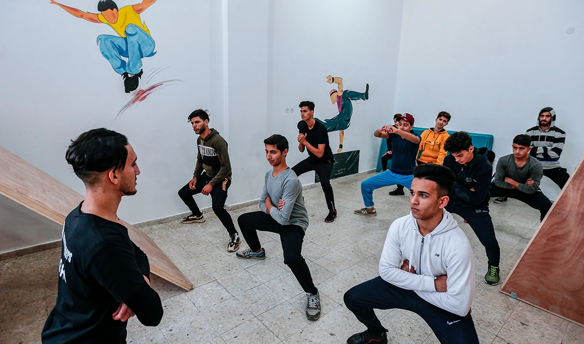 Palestinian boys train at the Wallrunners Parkour Academy in Gaza City. (AFP)