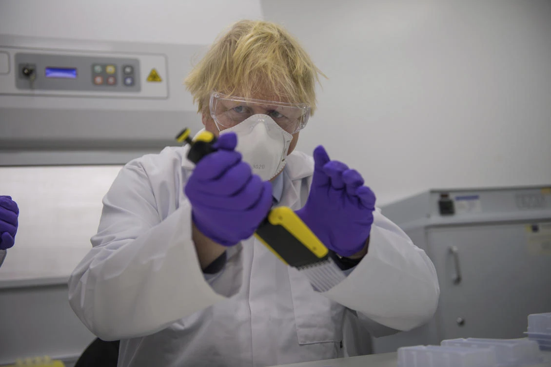 Britain's Prime Minister Boris Johnson visits the French biotechnology laboratory Valneva in Livingston, Scotland, Thursday Jan. 28, 2021. (AP)
