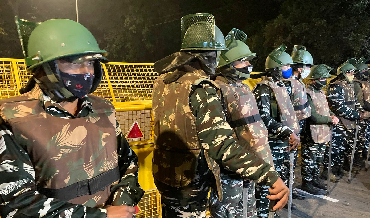 Policemen stand guard near the Israeli Embassy after a blast in the area in New Delhi, India, Friday, Jan. 29, 2021. (AP)