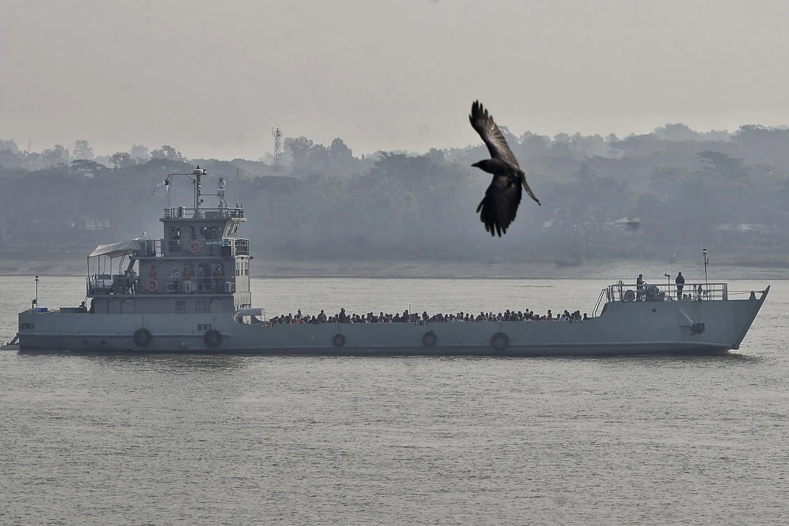 Rohingya refugees travel on a naval vessel to be relocated to to the island of Bhasan Char, in Chattogram, Bangladesh, Saturday, Jan. 30, 2021. (AP)