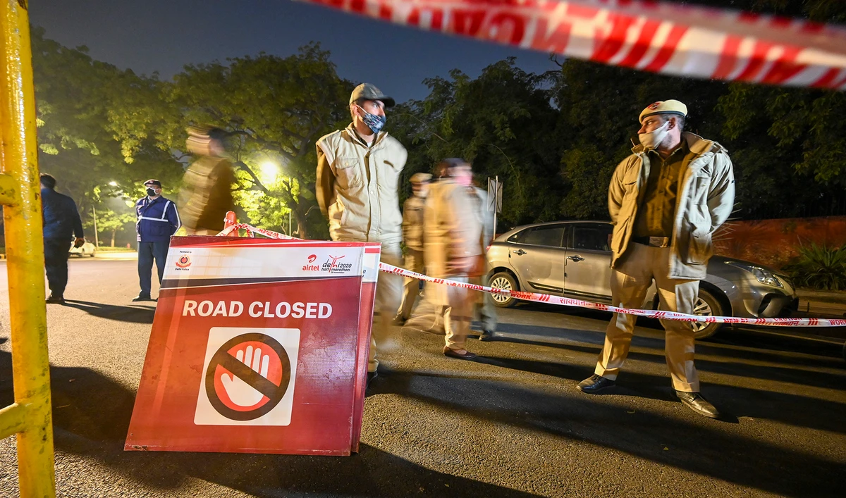 Police close off a street after an explosion near the Israeli embassy in New Delhi on Jan. 29, 2021. (AFP)