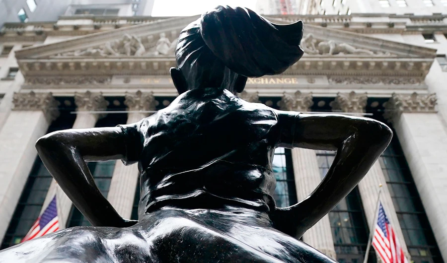 The Fearless Girl bronze sculpture by Kristen Visbal stands across from the New York Stock Exchange January 27, 20201. (AFP)