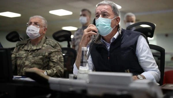 Turkish Defense Minister Hulusi Akar, right, and army commanders following Operation Claw-Eagle in northern Iraq, June 15, 2020. (AFP)