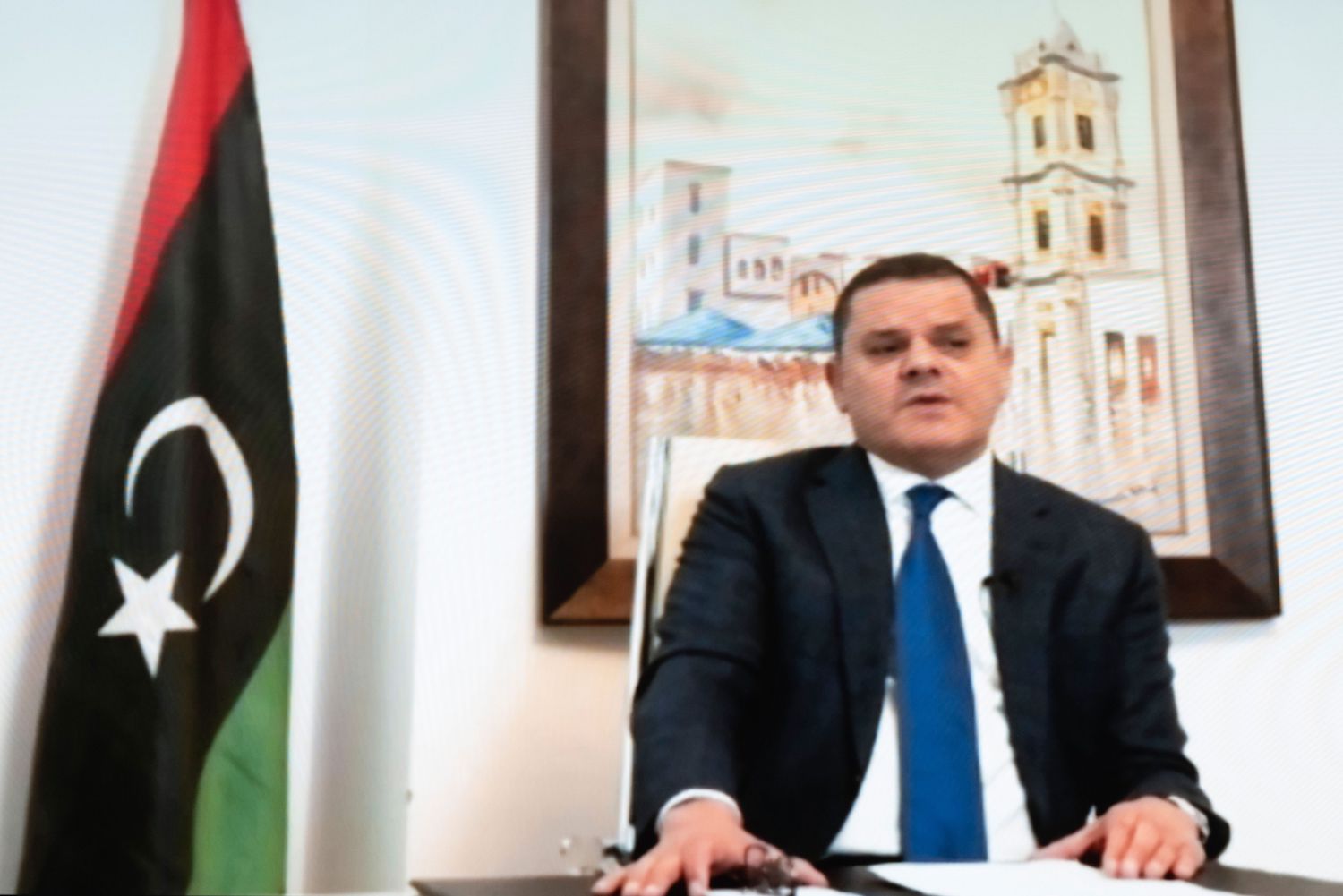 Abdul Hamid Mohammed Dbeibah delivers a speech via video link during a meeting of the Libyan Political Dialogue Forum (LPDF). (File/AFP)