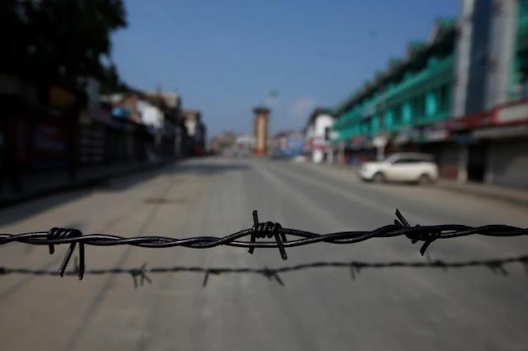 Barbed wire on a deserted road during restrictions in Srinagar, Kashmir, August 5, 2019. (Reuters)