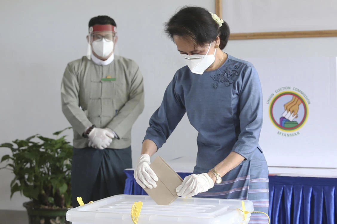 FILE — In this Oct. 29, 2020, file photo, Myanmar leader Aung San Suu Kyi casts her ballot during advance voting at the Union Election Commission office in Naypyitaw, Myanmar. (AP)