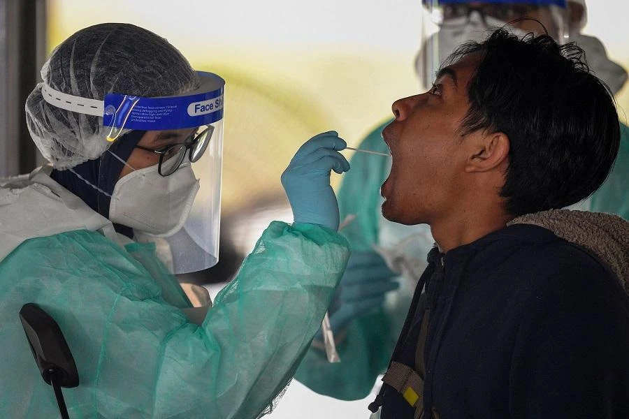 The health ministry also reported an additional 17 deaths, bringing total fatalities from the virus to 826. (File/AFP)