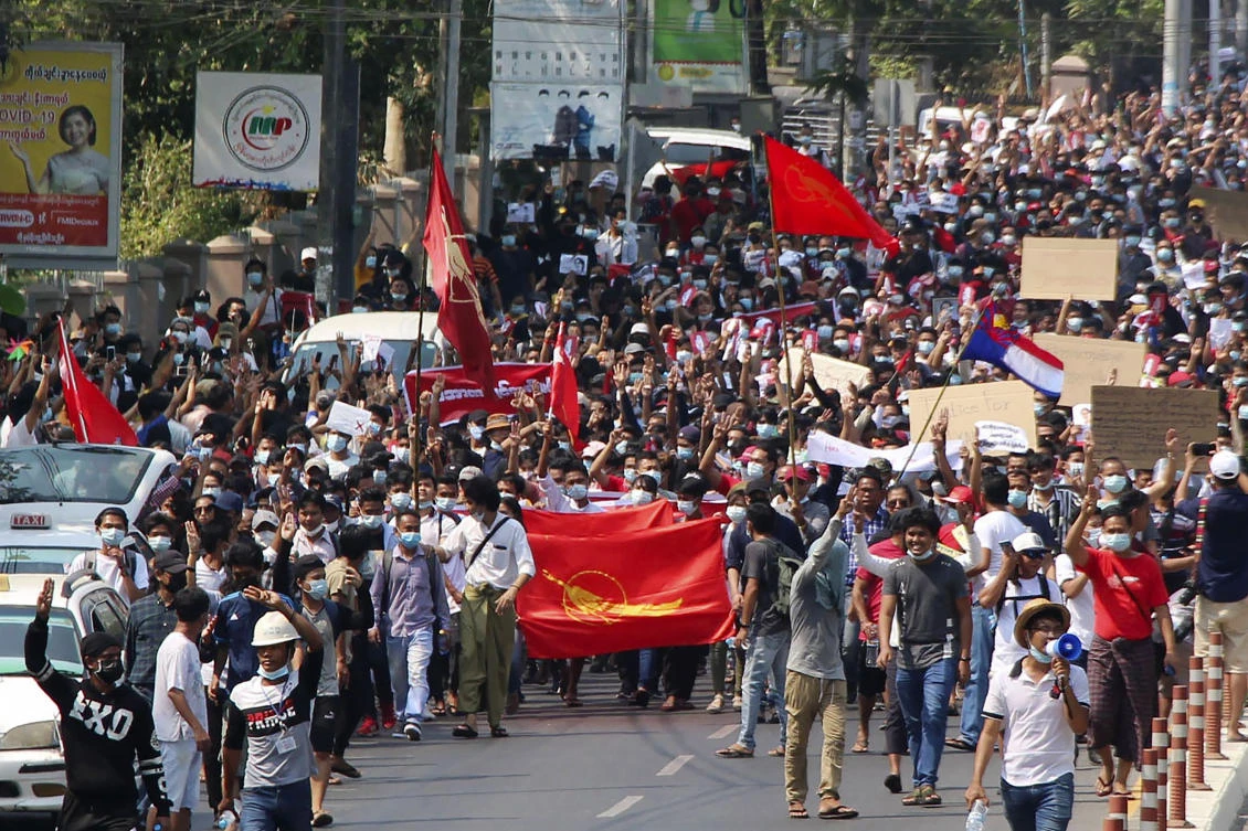 Thousands of protesters rallied against the military takeover in Myanmar’s biggest city on Sunday and demanded the release of Aung San Suu Kyi, whose elected government was toppled by the army that also imposed an Internet blackout. (Kyodo News via AP)