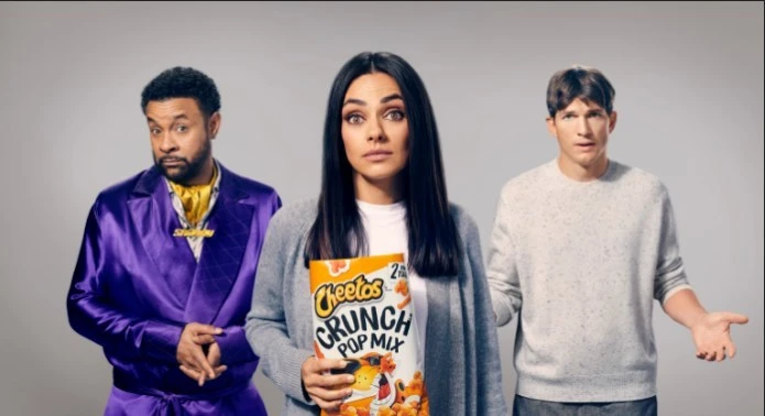 Ashton Kutcher and Mila Kunis starred in an amusing ad for Cheetos. (Supplied)