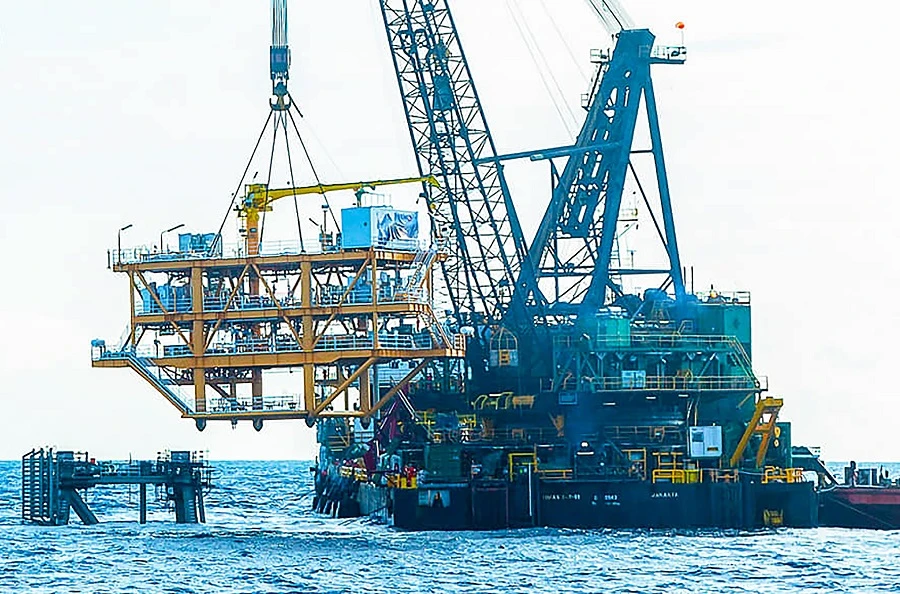 Brent crude prices have risen by around 59 percent since the beginning of November on the back of the discovery of COVID-19 vaccines. (File/AFP)