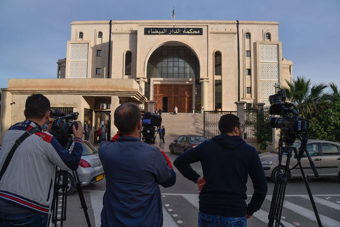 Journalists gather in front of the Algerian Dar Al-Baida tribunal in the capital Algiers.(AFP)