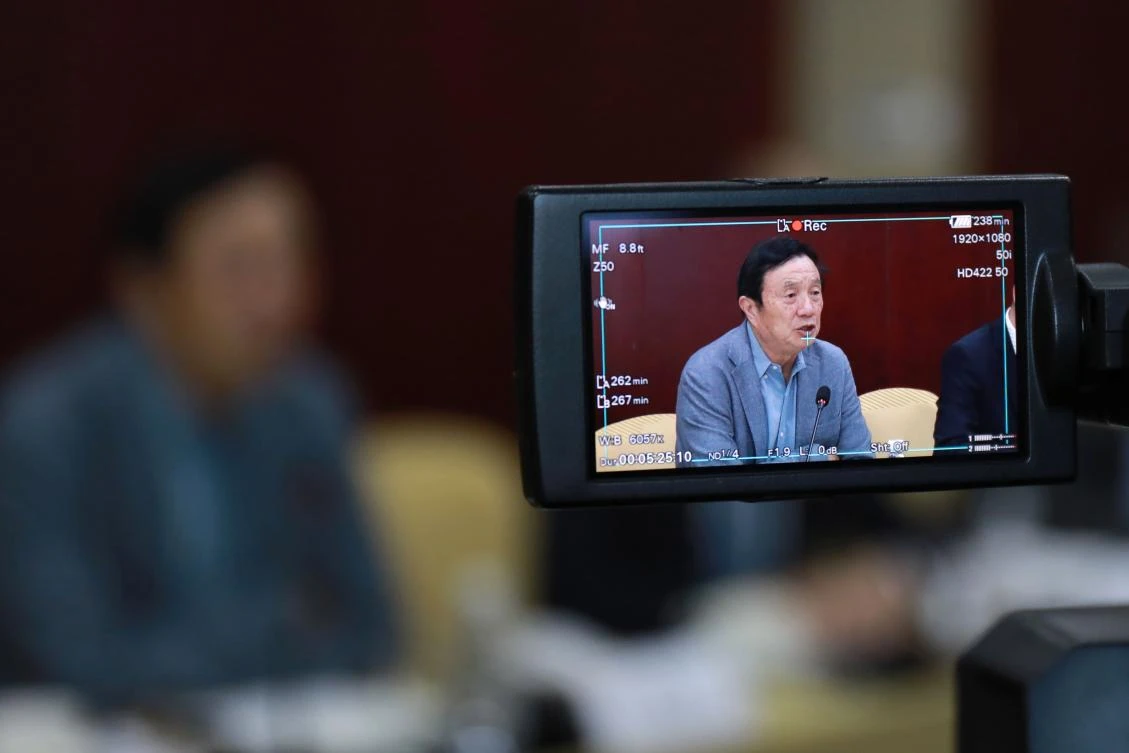 Huawei founder and CEO Ren Zhengfei is seen on a camera monitor during a press briefing in Taiyuan, in China’s northern Shanxi province on Feb. 9, 2021. (AFP)