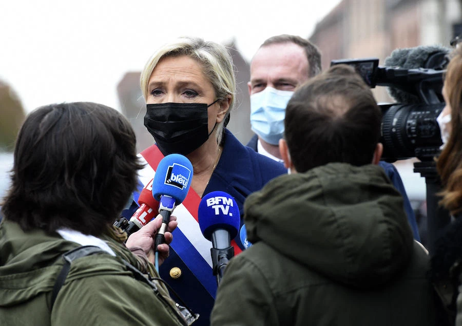 Polls show Le Pen will likely face off again against Emmanuel Macron in next year’s presidential contest, after her National Rally made its strongest showing ever in the 2017 vote (AFP)