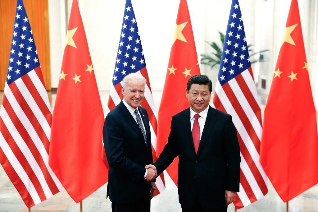 Then US Vice President Joe Biden meets with Chinese President Xi Jinping at the Great Hall of the People in Beijing on Dec. 04, 2013. (AFP file photo)