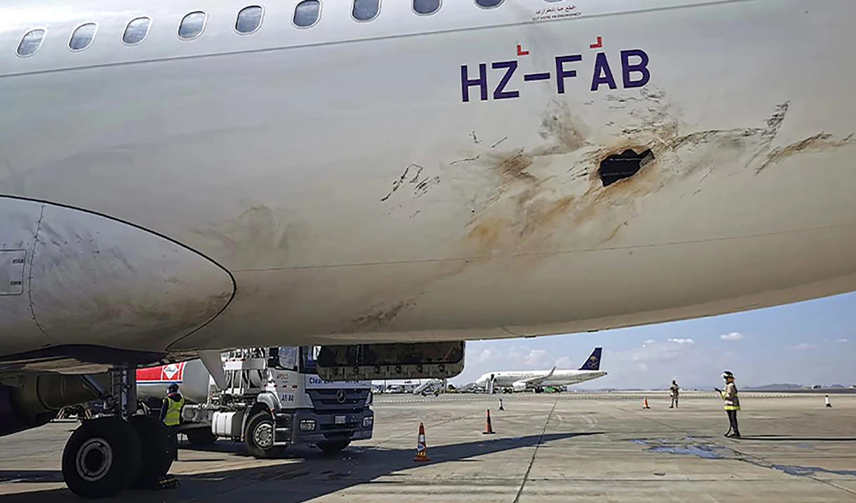 The picture shows a view of the damaged hull of a Flyadeal Airbus A320-214 aircraft on the tarmac at Abha International Airport in Saudi Arabia, on February 10, 2021. (Saudi Arabia's Ministry of Media via AP/File)