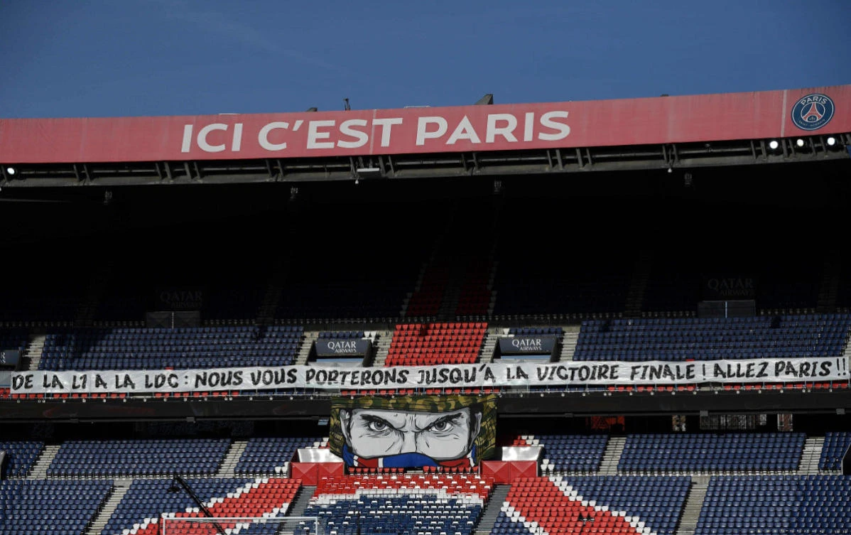 A giant banner reading "From L1 to the LDC (Champions League: we will support you until the final victory! Go Paris!" is displayed before the French L1 football match between Paris-Saint Germain (PSG) and Nice at The Parc des Princes Stadium in Paris on February 13, 2021. (AFP / FRANCK FIFE)
