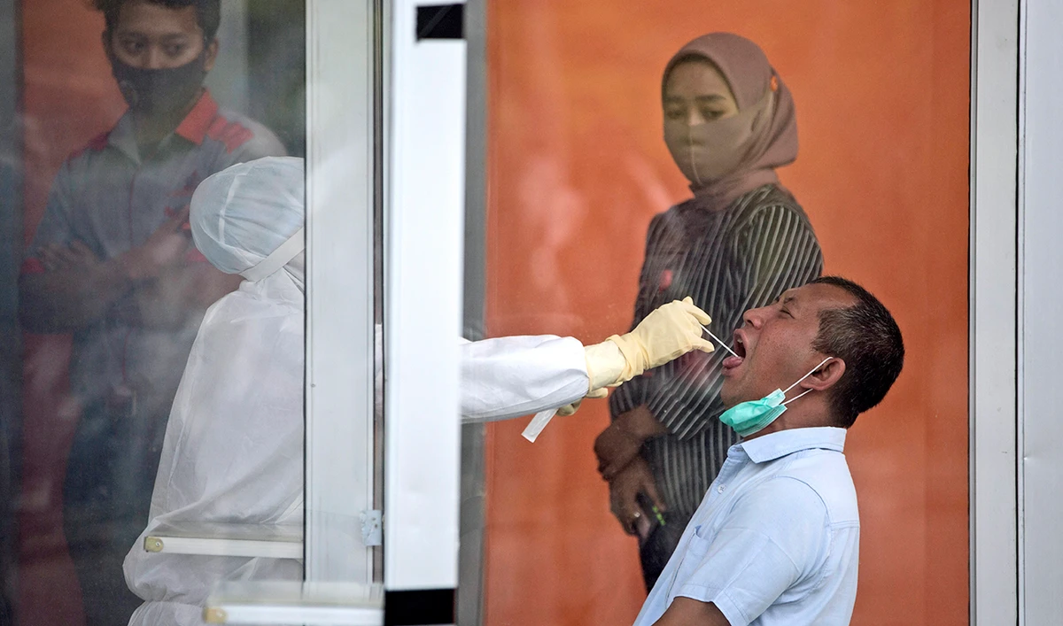 Indonesia gets tough on COVID-19 vaccine skeptics as phase two of inoculations begins