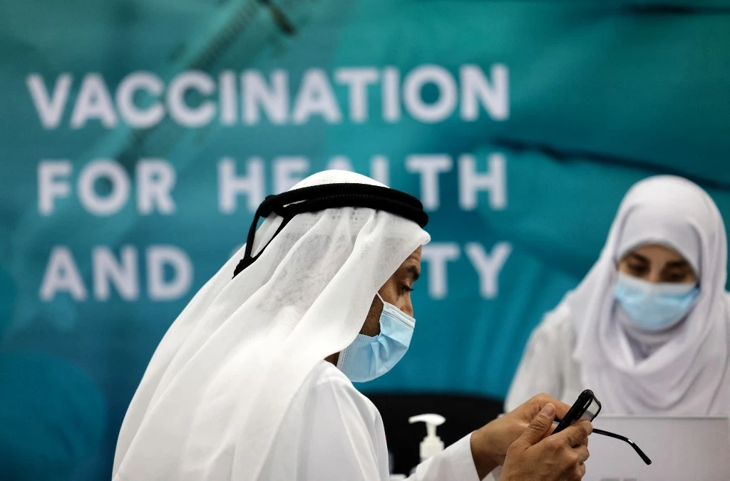 A man registered before receiving a dose of vaccine against the coronavirus at a vaccination centre set up at the Dubai International Financial Center in the Gulf emirate of Dubai, on Feb. 3, 2021. (File/AFP)