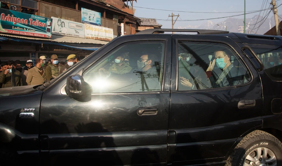 One of the visiting diplomats waves towards media after visiting the Hazratbal shrine in Srinagar, Indian controlled Kashmir, Wednesday, Feb. 17, 2021. (AP)