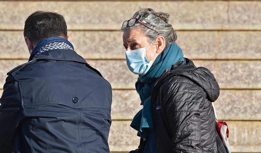 Francoise Grandclaude arrives to the Algerian Dar Al-Baida tribunal in the capital Algiers on February 18, 2021, for the trial of men accused of murdering her husband Herve Gourdel. (AFP)