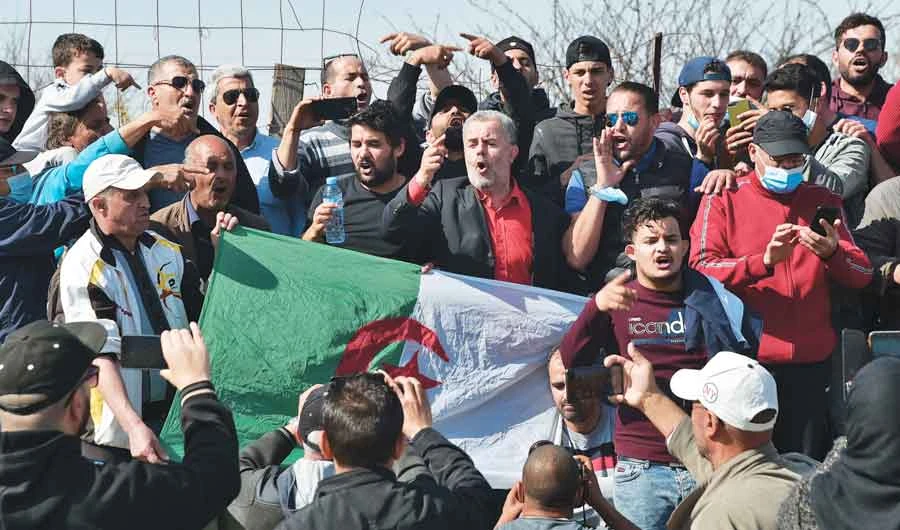 Algerians gather outside the Kolea prison near the city of Tipasa, some 70km west of the capital Algiers on Friday. (AFP)