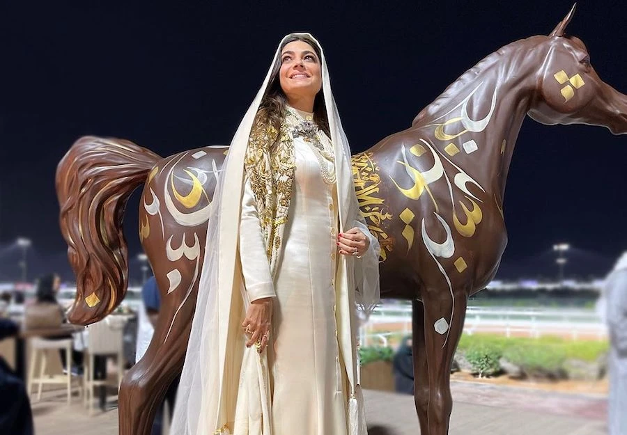 Designer Honayda Serafi attends the 2021 Saudi Cup wearing her own design. Instagram