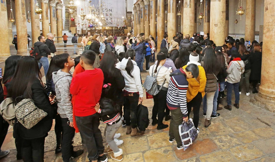 Christian tourists visit the Church of the Nativity in the biblical West Bank city of Bethlehem. (AFP file phto)