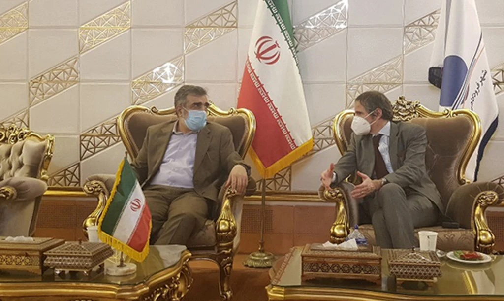 Iran’s Atomic Energy Organization’s spokesman Behrouz Kamalvandi, left, speaks with Rafael Mariano Grossi, Director General of the International Atomic Energy Agency, upon his arrival at the Imam Khomeini International airport in Tehran. (AFP)