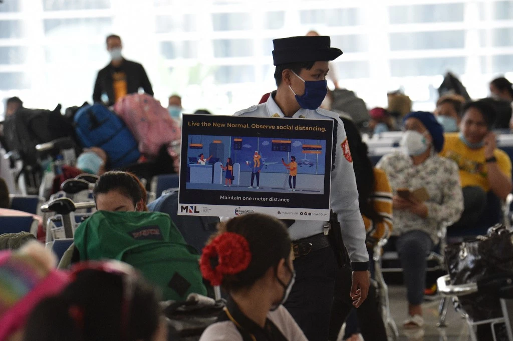 Half a million overseas Filipino workers were displaced from work in 2020, and most of them have been repatriated. (AFP file photo)